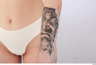 Rada forearm nude tattoo 0006.jpg
